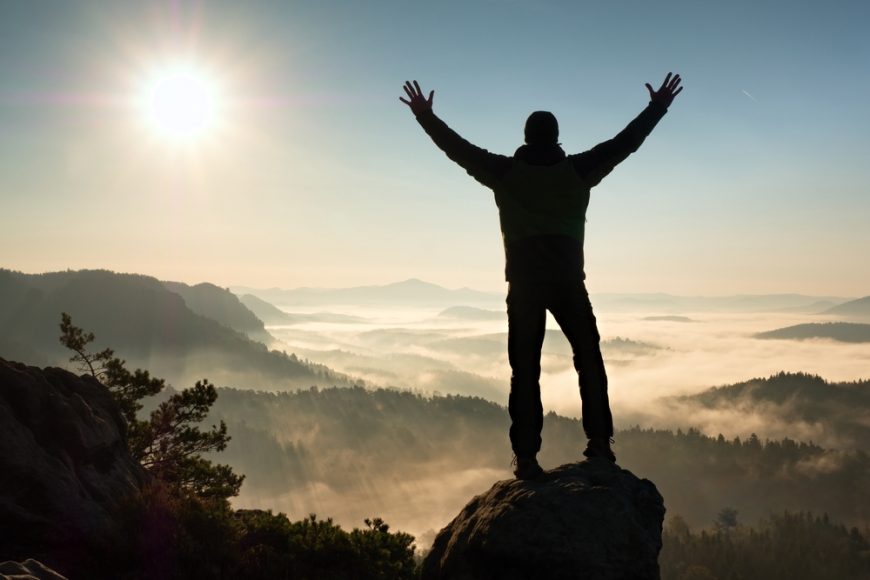 Happy,Man,With,Raised,Arms,Gesture,Triumph,On,Exposed,Cliff. » WORLD